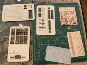 Store display cases from a laser-cut wood kit.