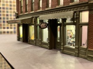 Pharmacy sign and retracted awning installed.