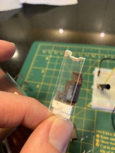 Had to remove and reinstall the window glazing in front of the flickering TV after it got hazy from glue vapor.