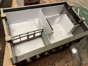 Window wall painted and assembled but not yet frosted.