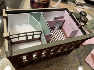 Wall graphics applied on remaining second floor walls.