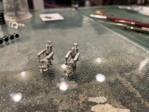 Cast metal salon chairs assembled.