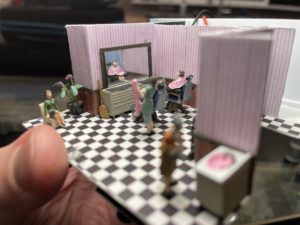 Customer admires her new do in the mirror.