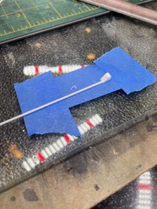 Constructing a down spout and scupper.