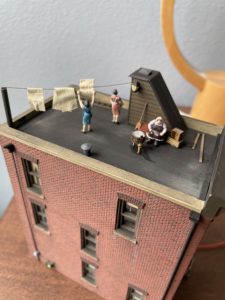 Rooftop laundry scene.