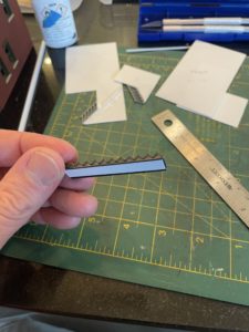 Styrene stairs with styrene sheet backing.