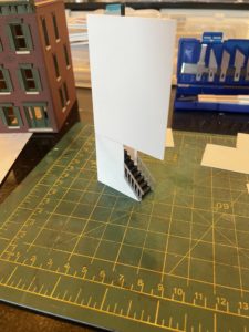 Walls attached to stairs.