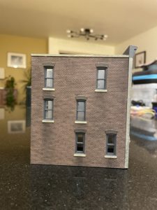 Side view of weathered building.