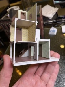 Side view of building with wallpaper and flooring installed.