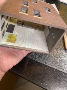 Wallpaper on left side of building.