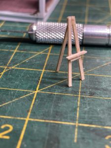Easel made of scale lumber.