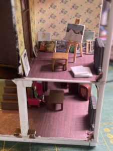 Stool made from a chair with its back removed.